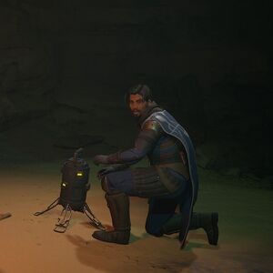 Staban Tuek setting up an explosive device