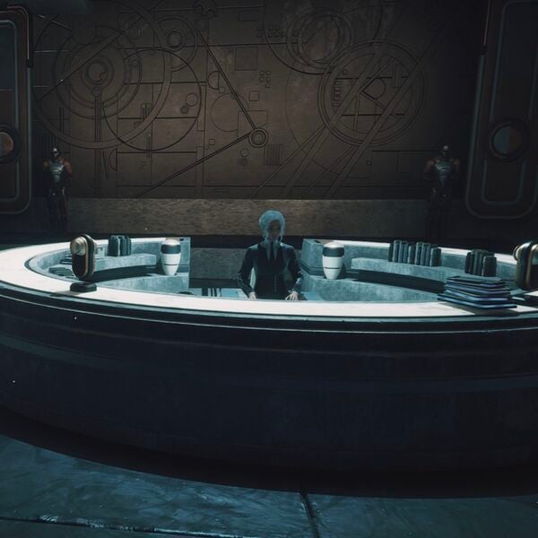 Velma Udec sitting at her desk